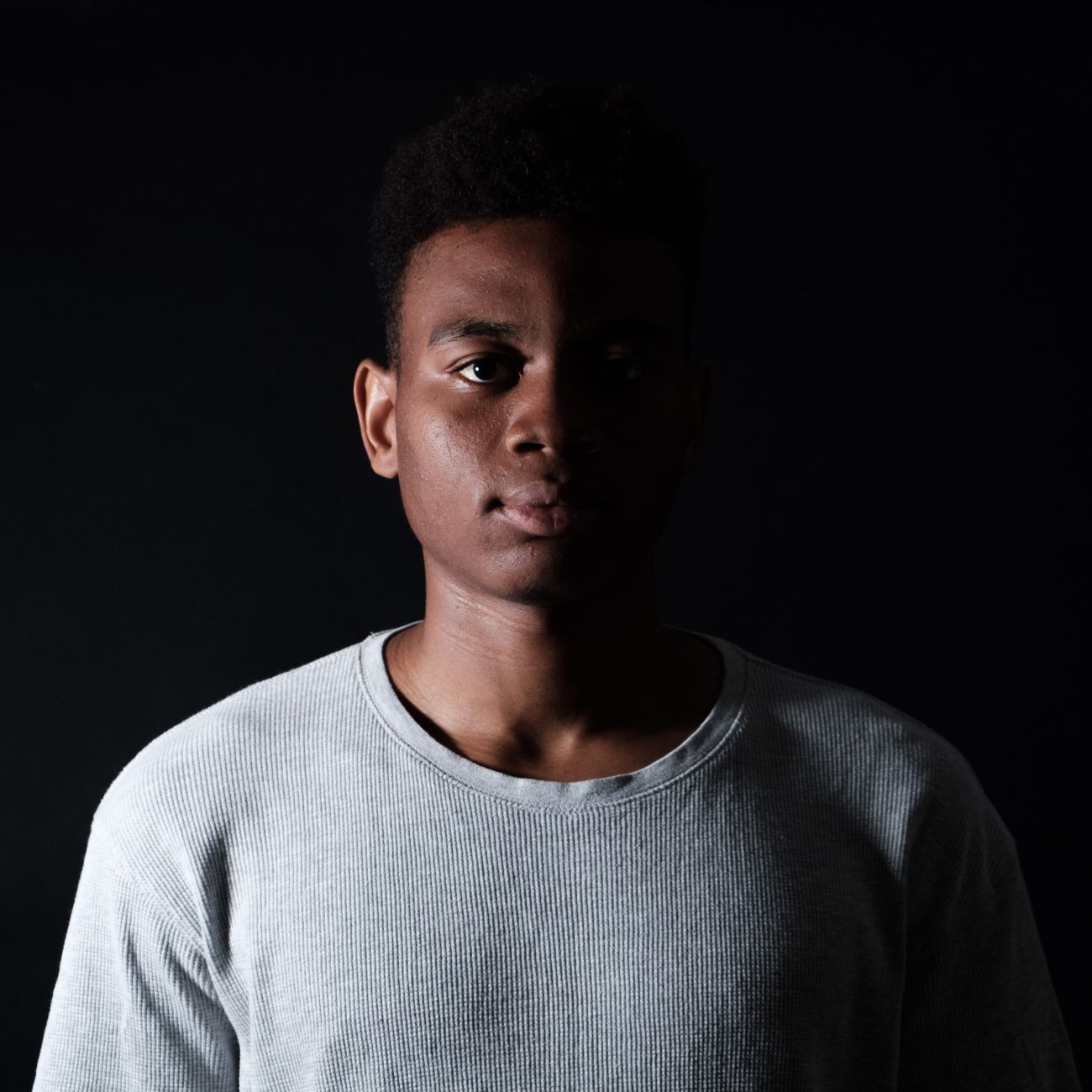 Portrait of a young man looking at the camera