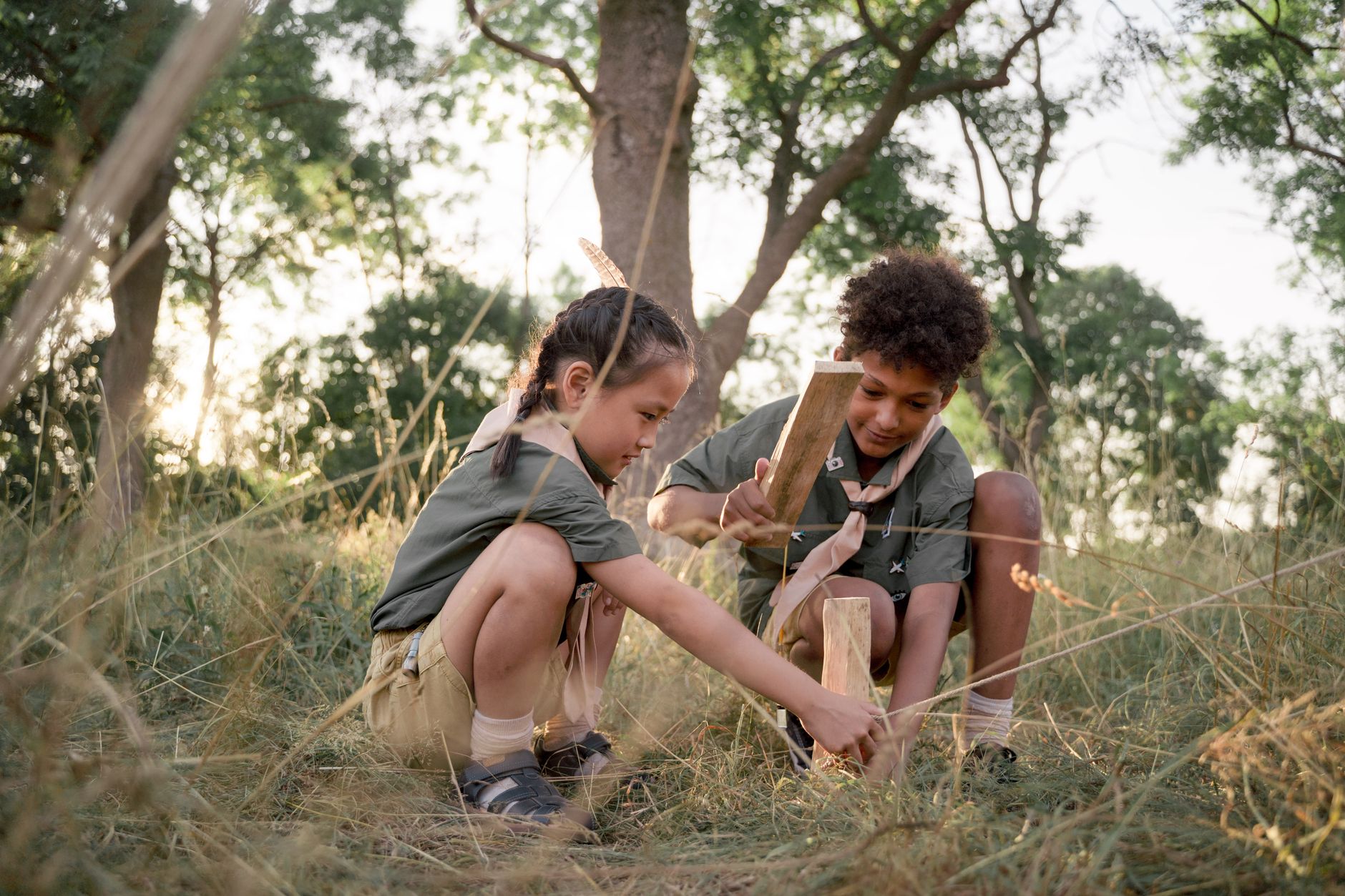 Children playing in a sunny summer field