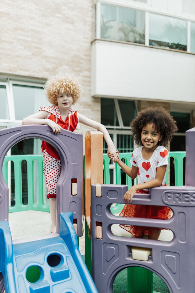 Children enjoying outdoor playground time