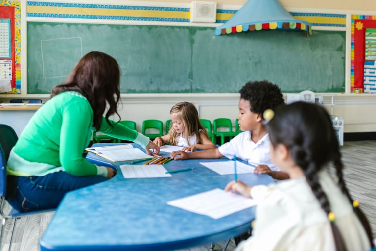 Children learning together in a bright classroom