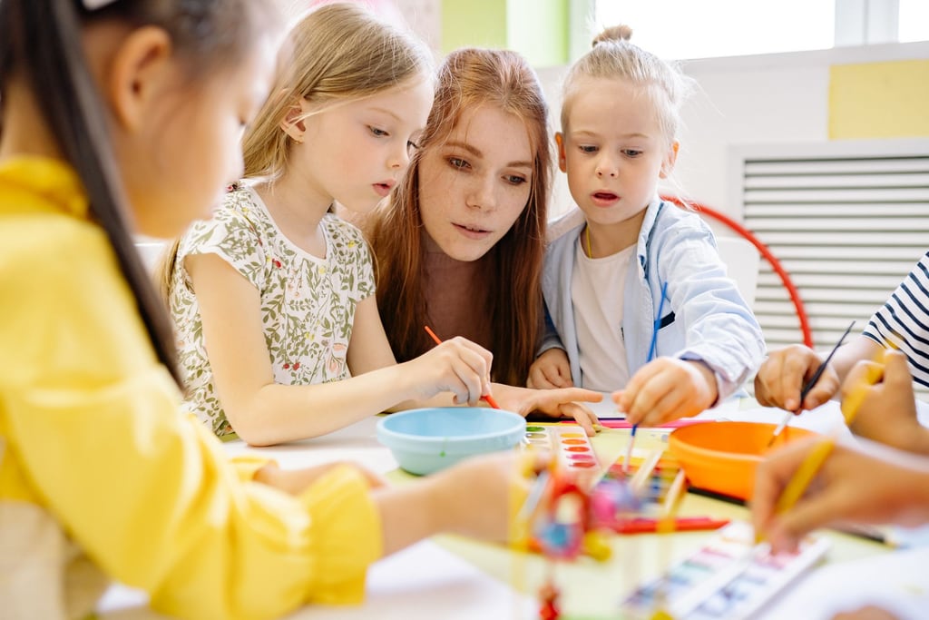 Children working together on a painting